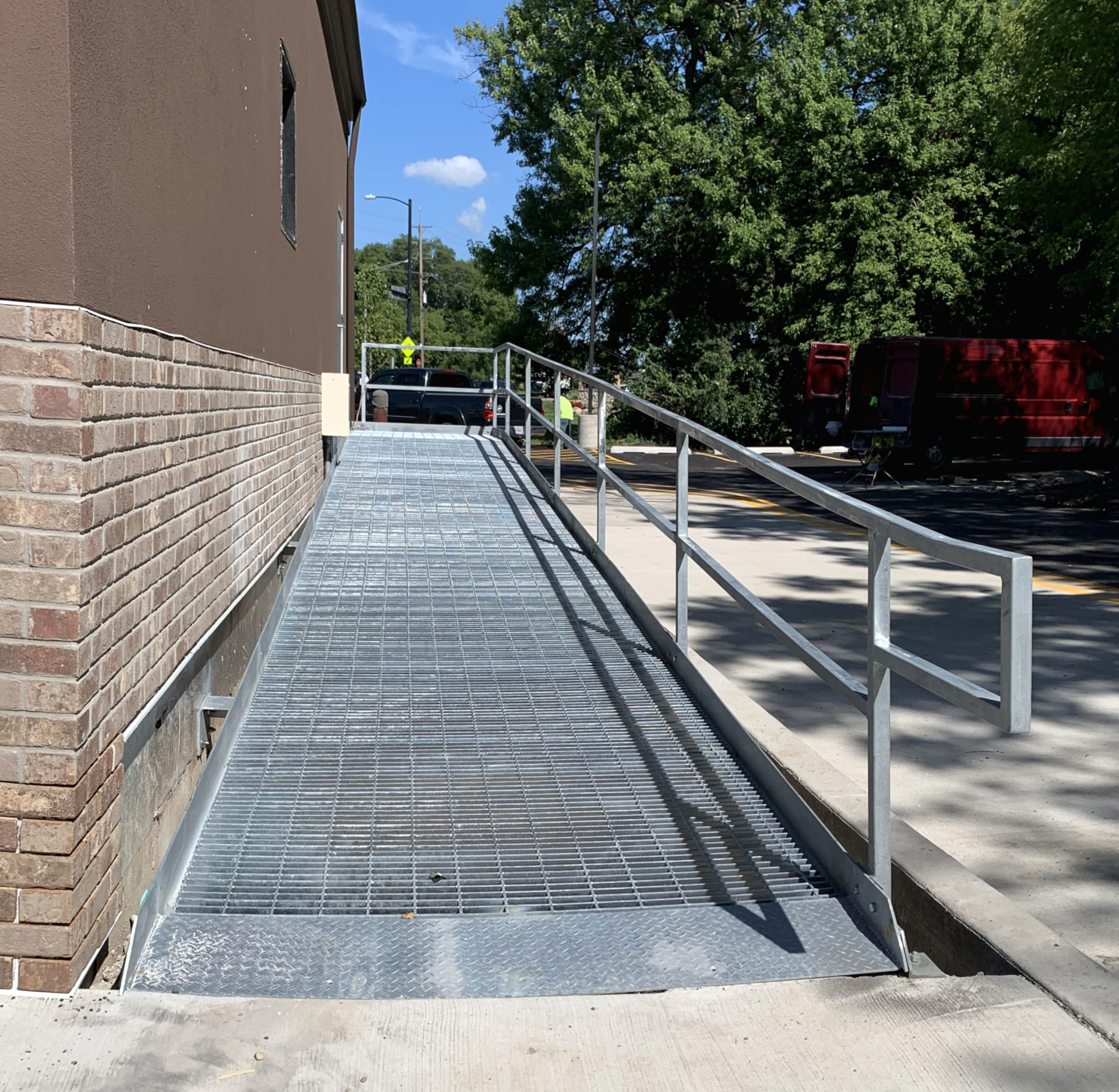 Commercial Galvanized Ramp with Bar Grating in River North Signature
