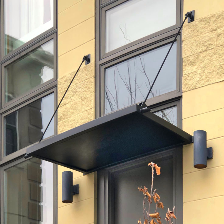 Custom wrought iron awning painted satin black side