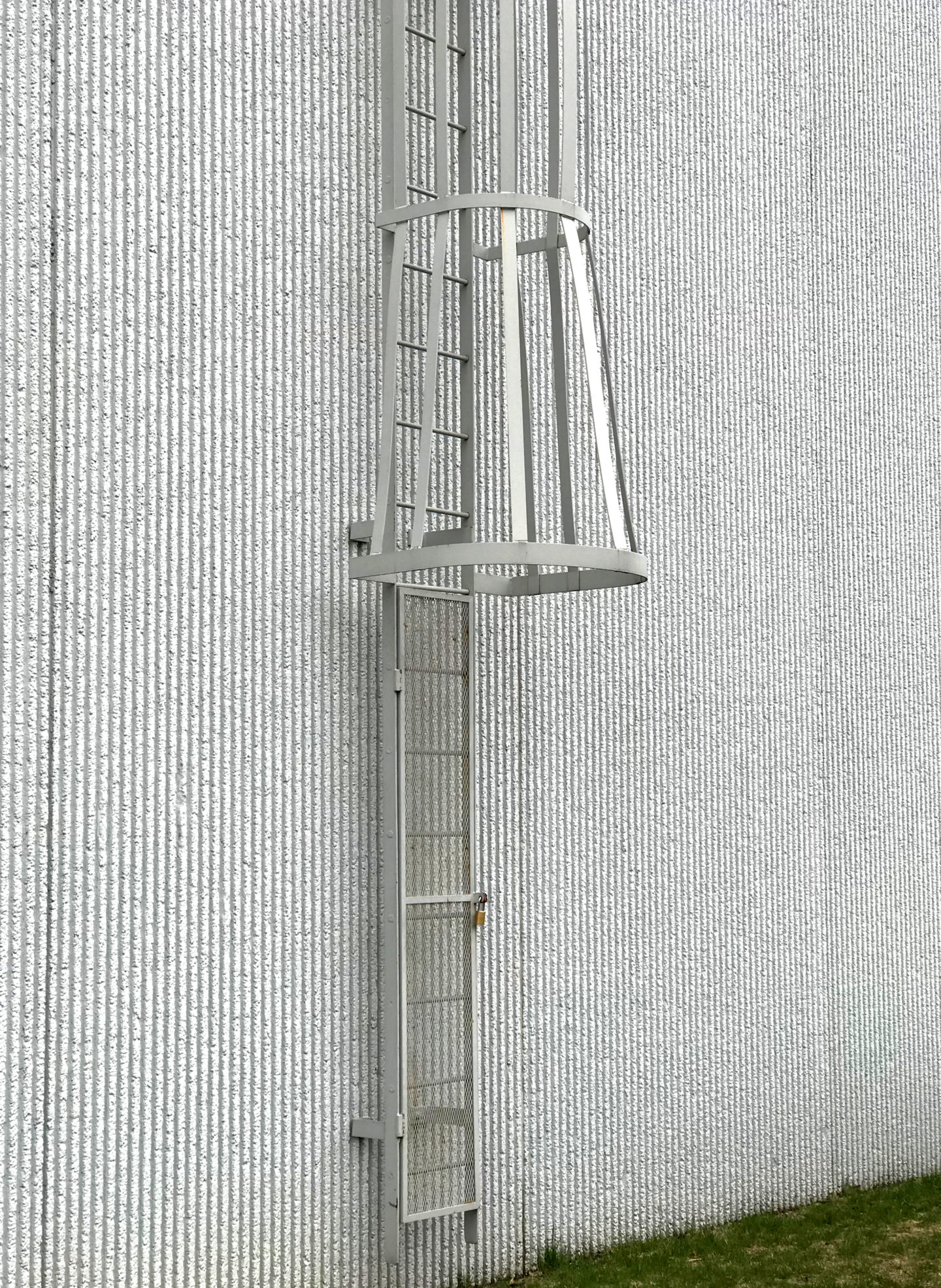 Custom wrought iron commercial roof access painted satin white closeup