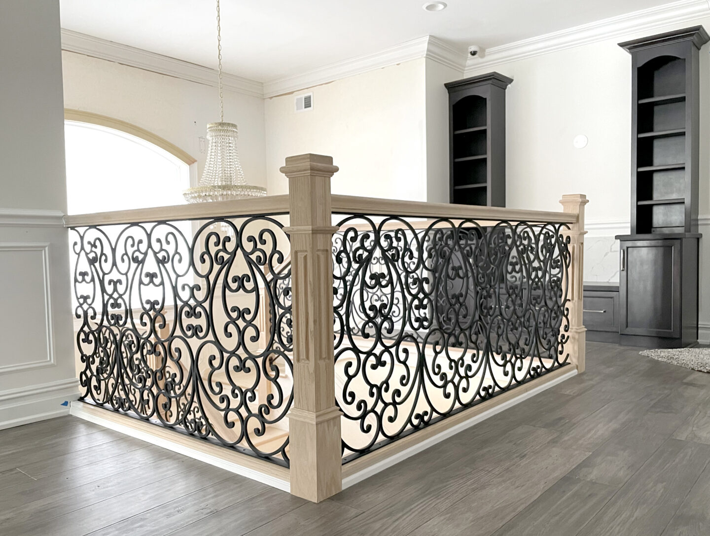Custom wrought iron railings french country painted flat black top of staircase railing view