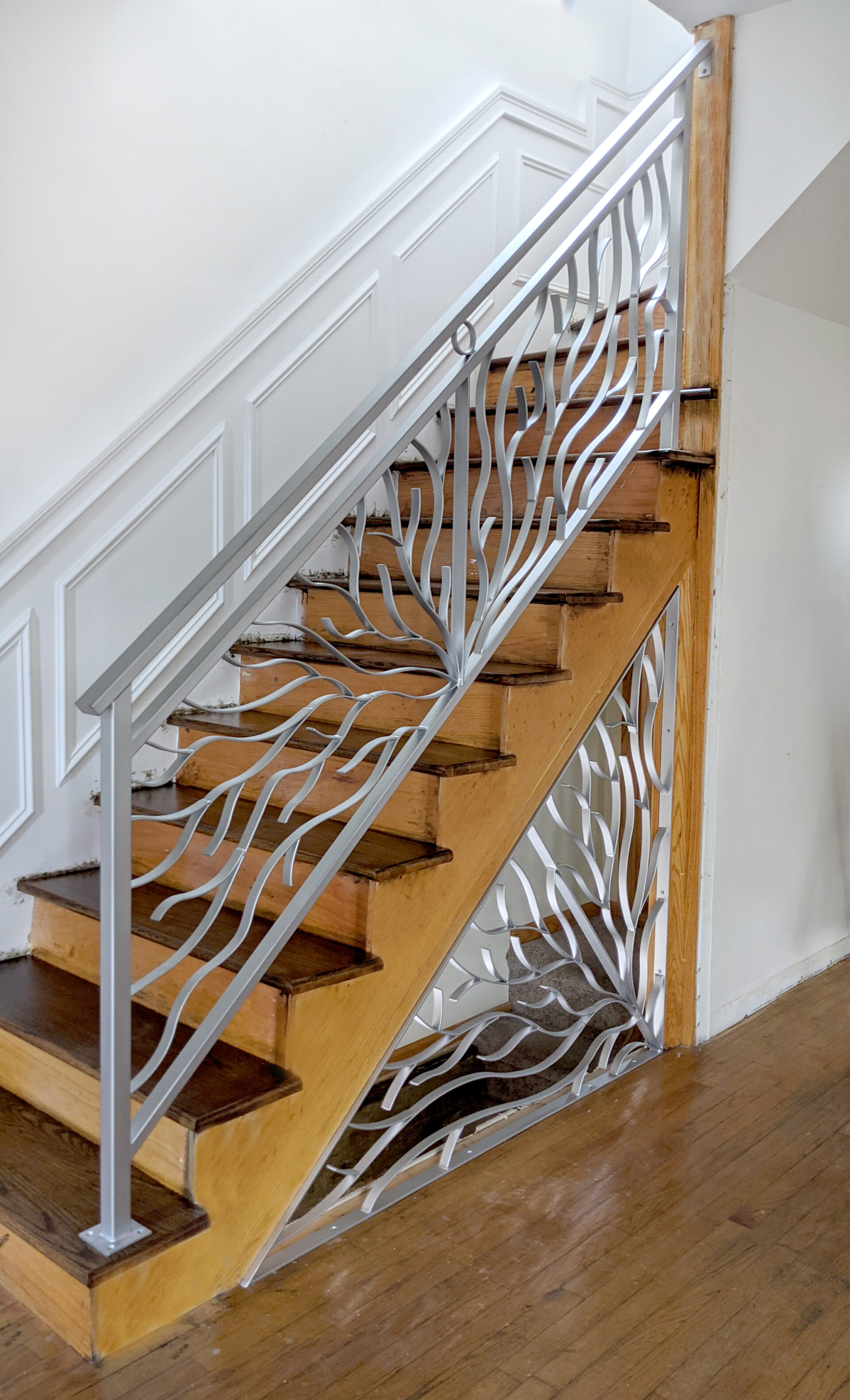 Art deco wrought iron railings painted satin black in Kenosha