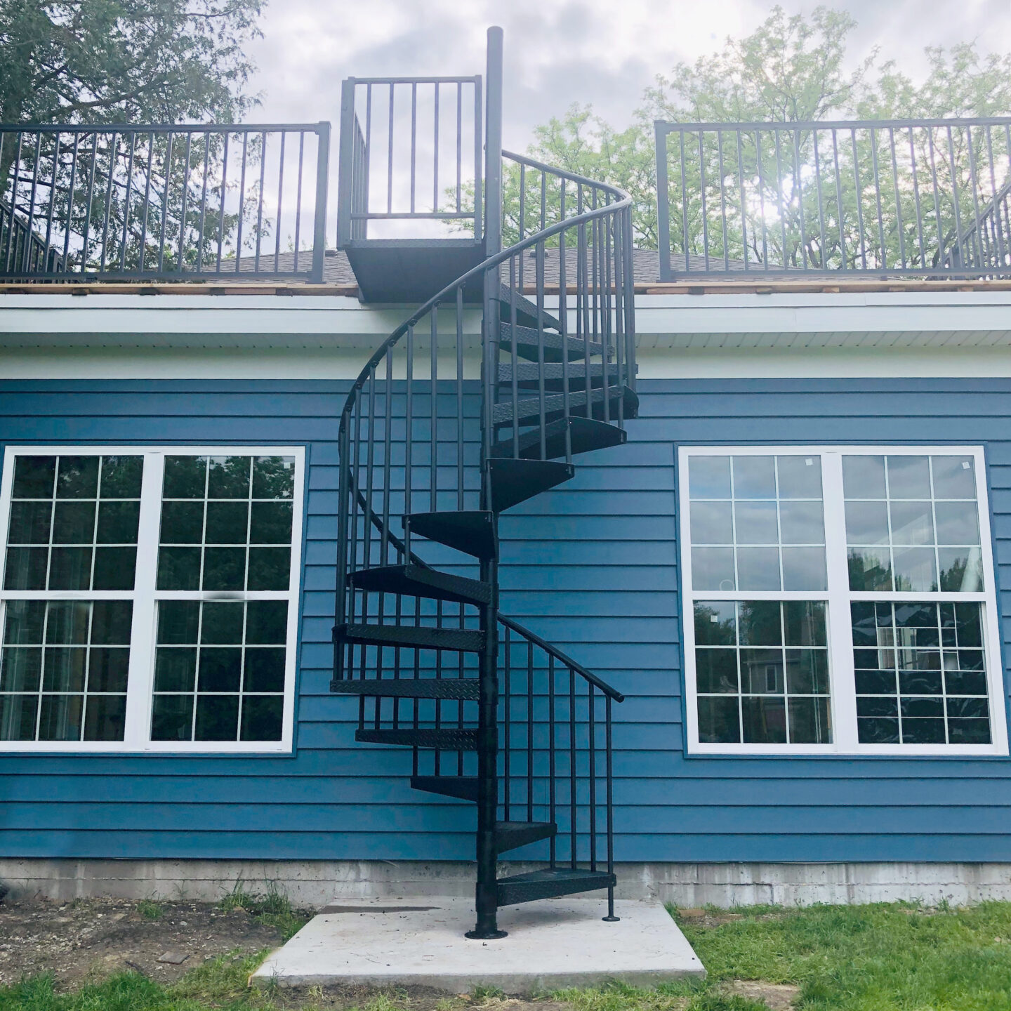 Custom wrought iron stairs traditional painted satin black full view