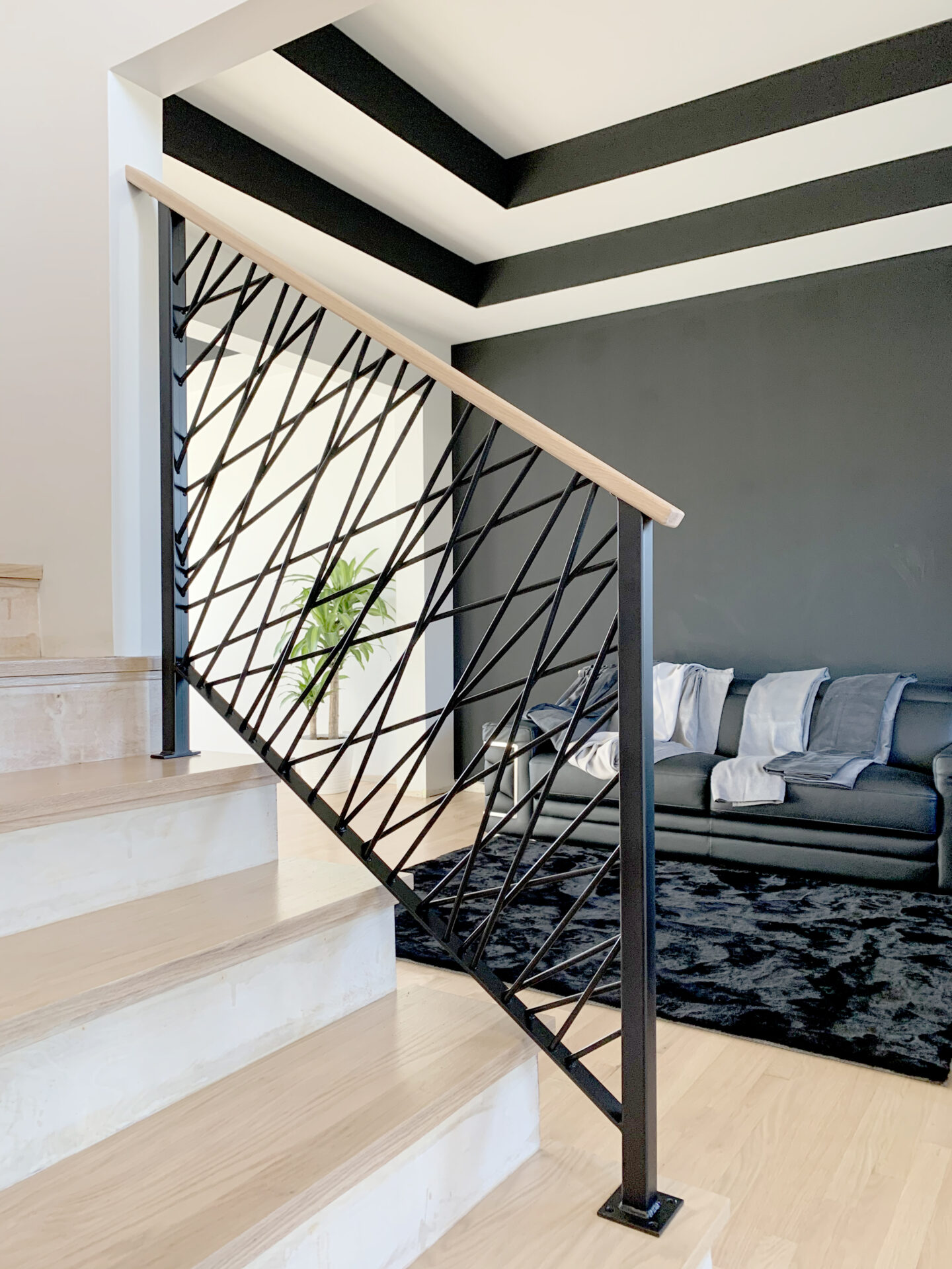 Custom wrought iron & wood railings art deco painted satin black short stairs