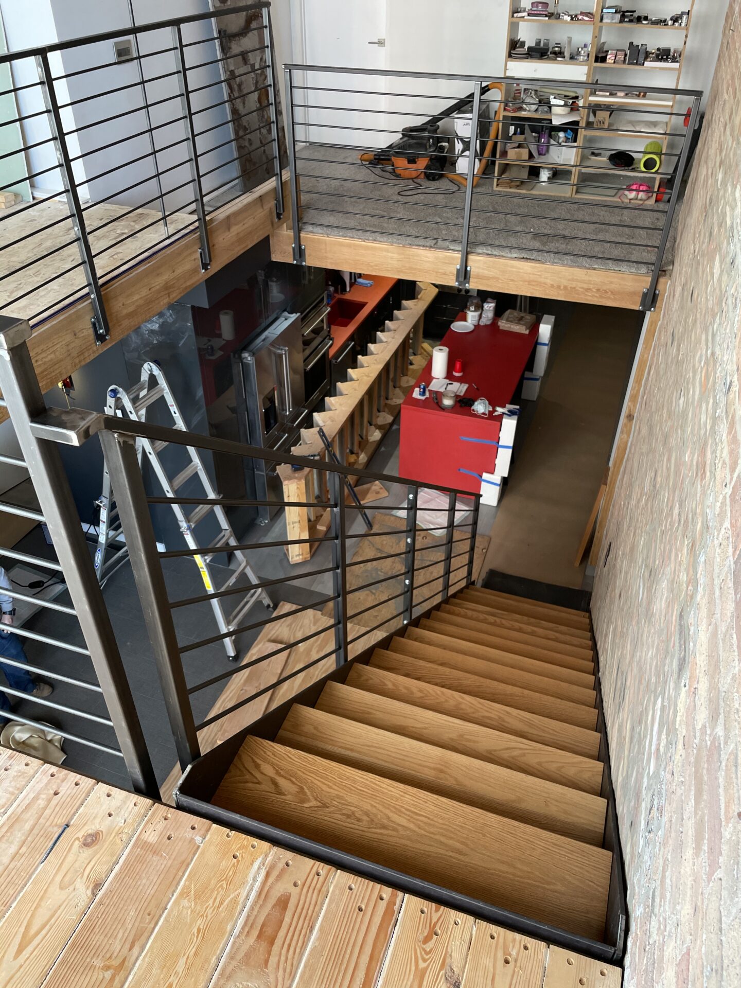 Custom wrought iron & wood stairs urban modern painted clear coat top stairs