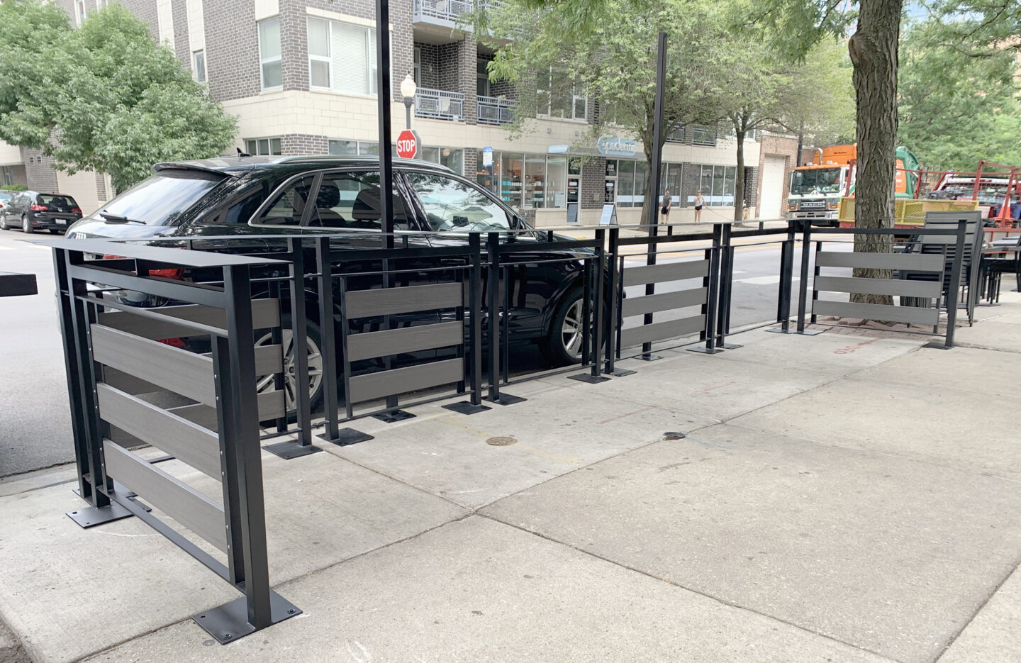 Traditional wrought iron commercial patio railing set painted satin black in Chicago