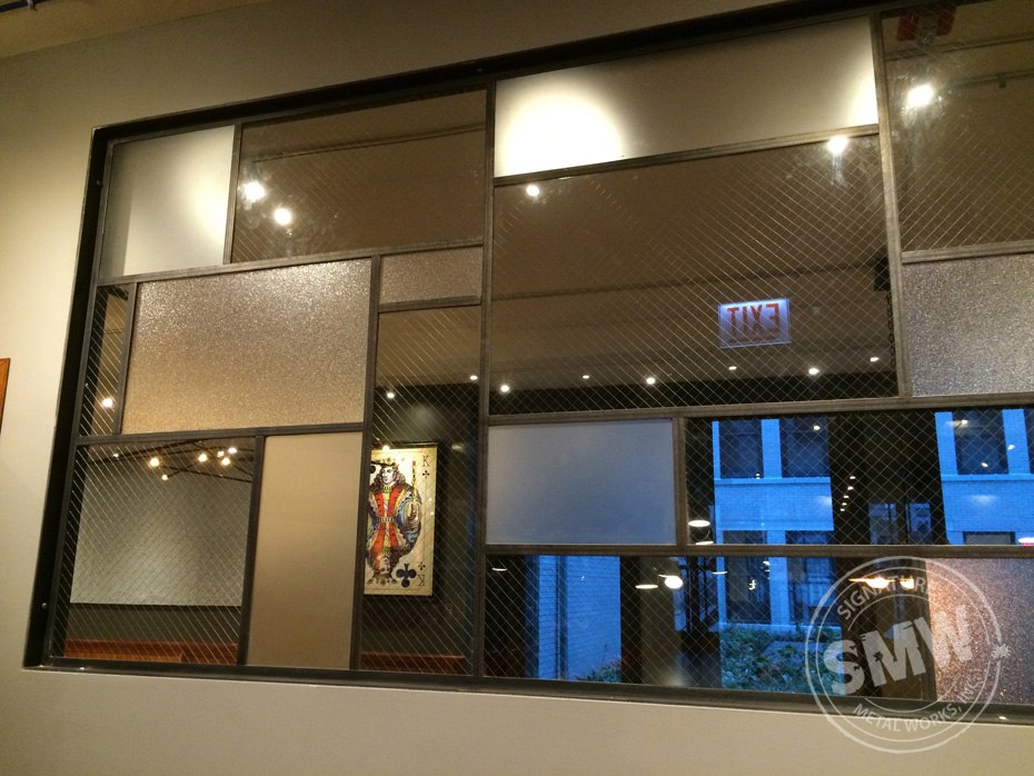 Custom Commercial Wrought Iron Window Frames in Chicago Signature Metal Works