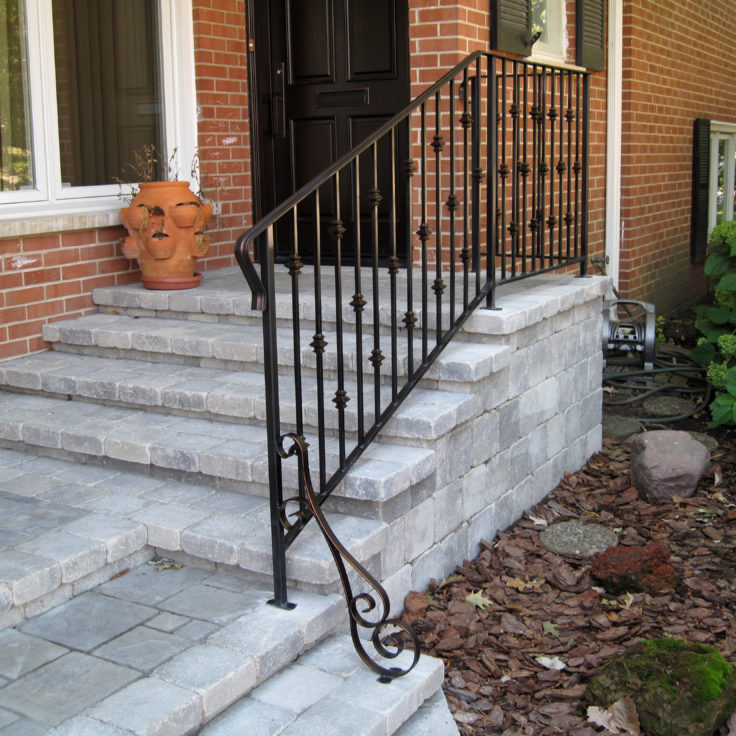 Custom traditional wrought iron collar railings painted copper patina-over-black for a client in Deerfield