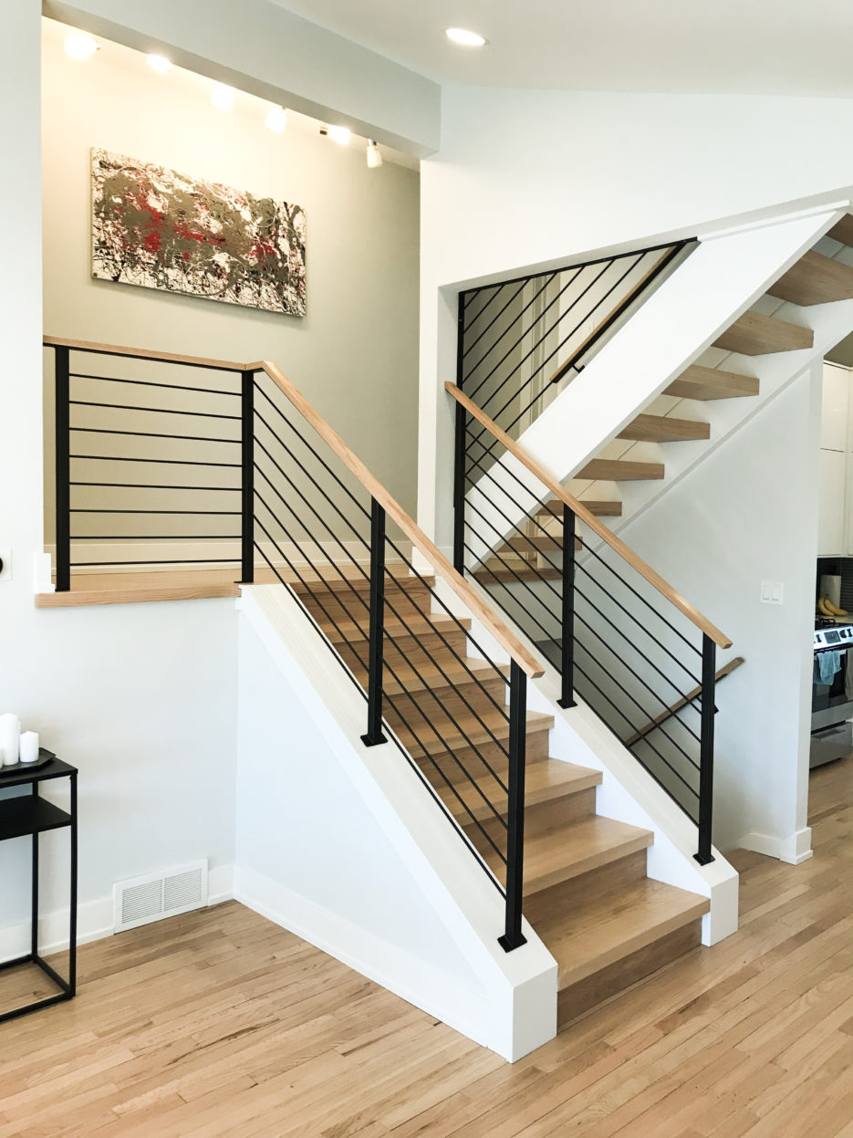 Custom urban modern wrought iron horizontal bar railings painted satin black for a client in Arlington Heights