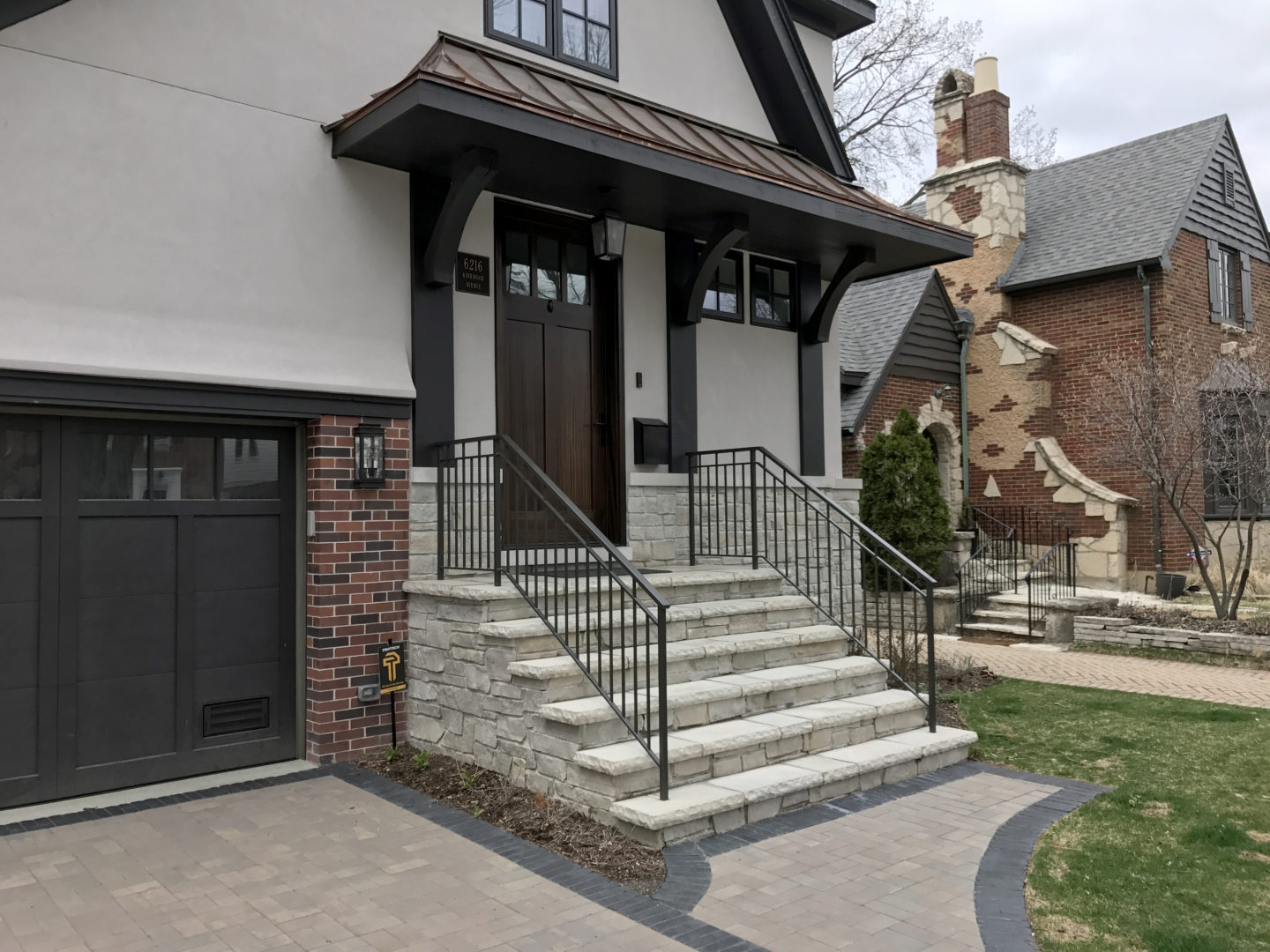 Custom urban modern wrought iron vertical bar railings painted satin black for a client in Niles