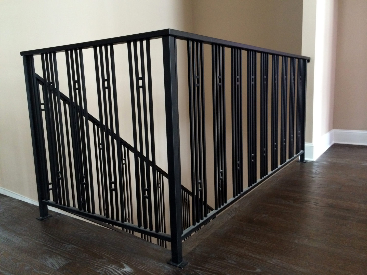 Custom urban modern wrought iron vertical bar railings painted satin black for a client in Northbrook