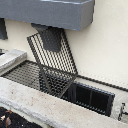 wrought-iron-window-well-cover