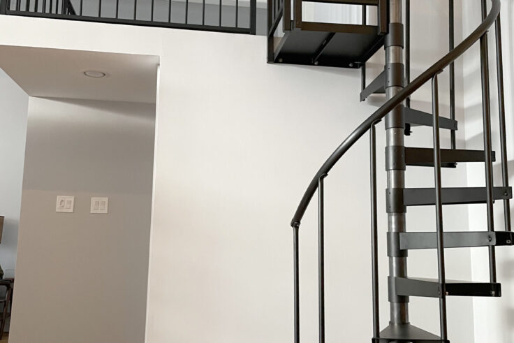 Custom wrought iron stairs urban modern powder coated black downstairs view